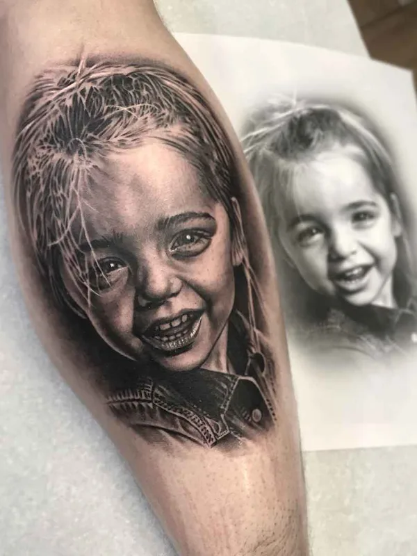black and grey realism Tatuaggio su calf #18220 | Tatuatore Rob Richardson
