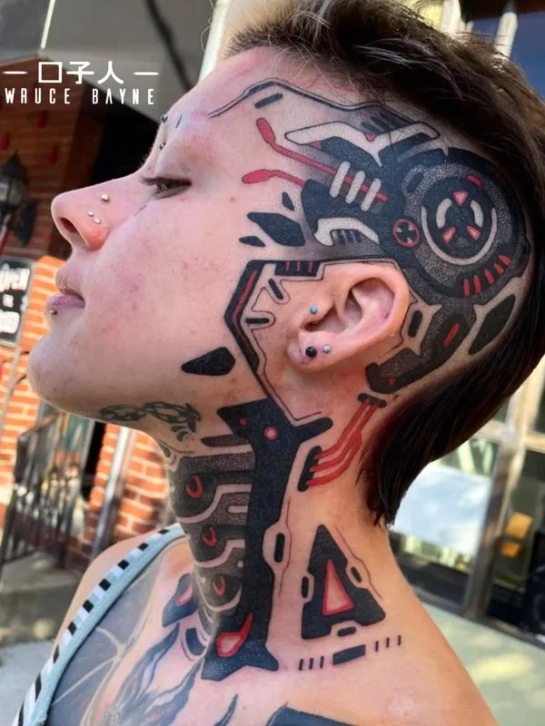 female color biomechanical tatuaje en face #63515 | Tatuador Wruce Bayne