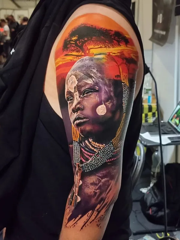 color realism Tatuaggio su upper arm #63568 | Tatuatore Dean Gunther