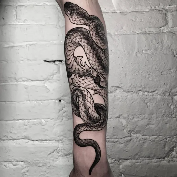 Graphic tattoo by doskaladas in Valencia