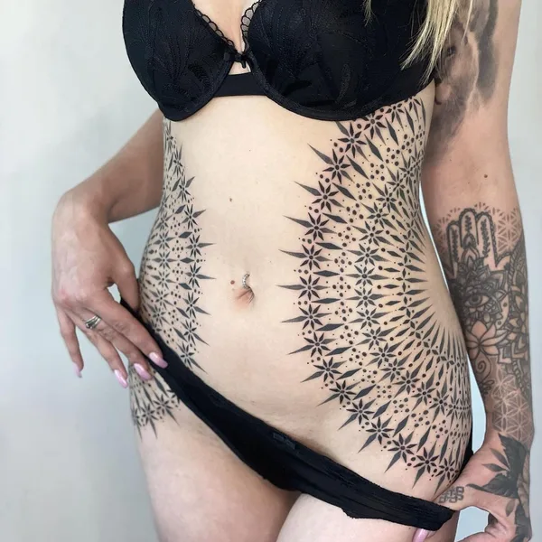 Ornamental tattoo by Suttoos in Dublin