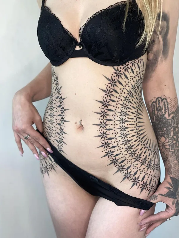 Ornamental tattoo by Suttoos in Dublin