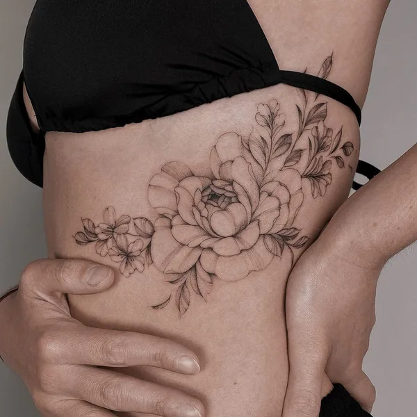 Feminine tattoo by Nicazky in Zürich