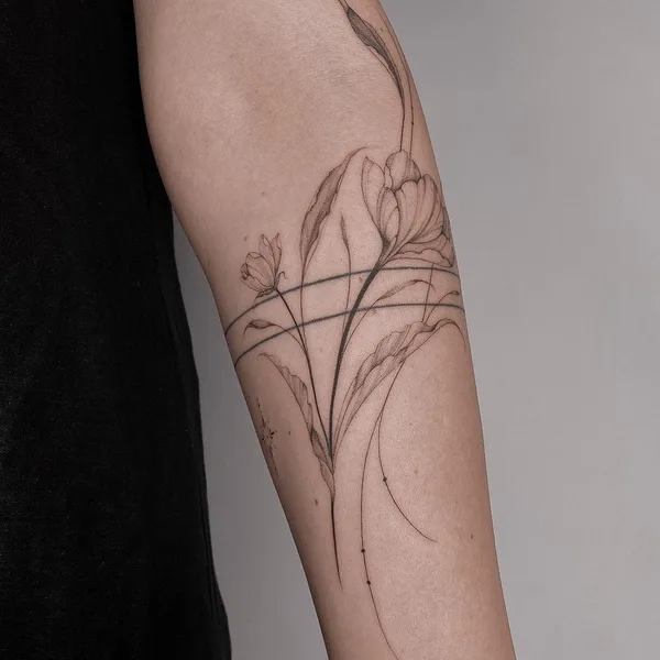 Feminine tattoo by Nicazky in Zürich