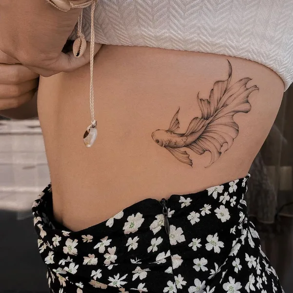 Feminine tattoo by Nicazky in Zürich