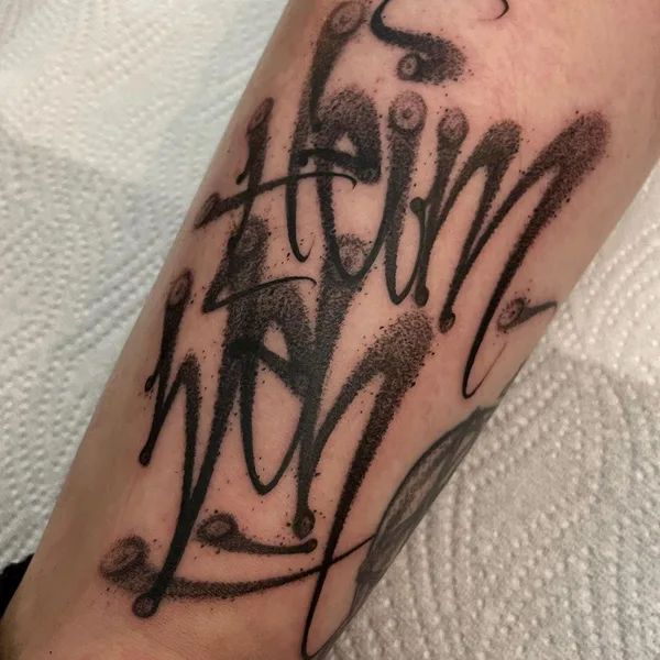 Calligraphy tattoo by Dustin | DESUR in Hamburg