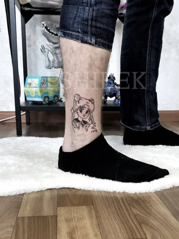 black anime tattoo on ankle #31527 | Tattoo Artist Андрей Пшибек