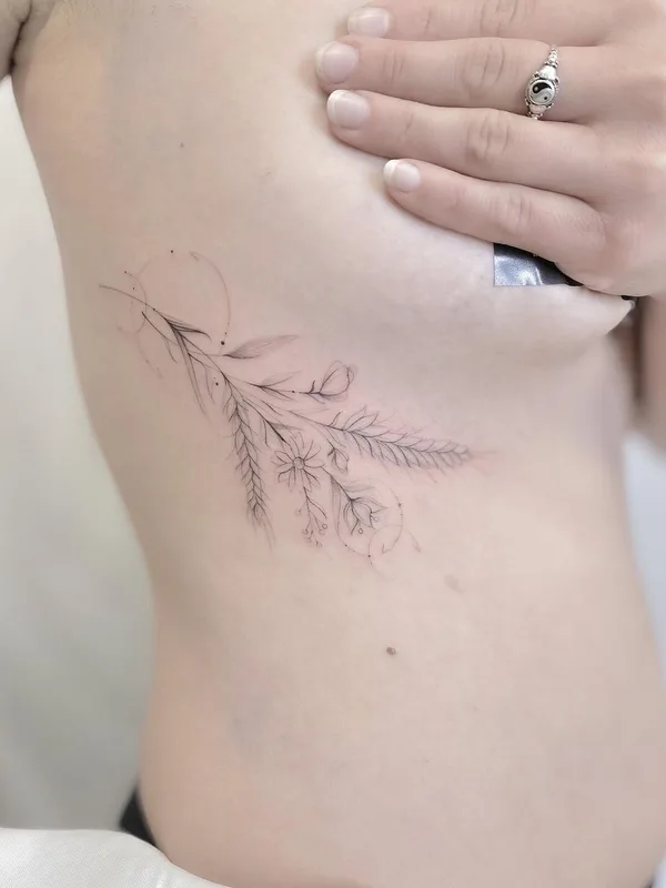 female black fineline tatouage sur ribcage #43423 | Artiste tatoueur Dastin Gregorio