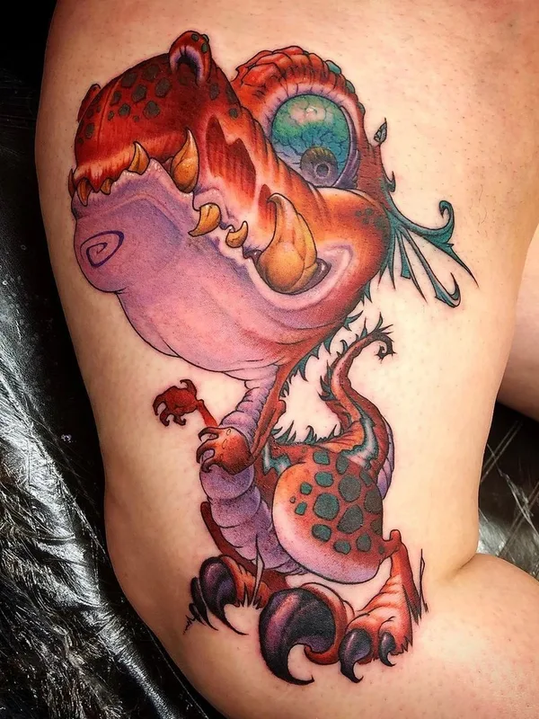color cartoon Tatuaggio su thigh #63695 | Tatuatore Jesse Smith