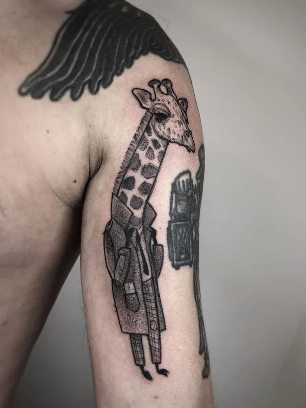 black and grey illustrative tattoo auf upper arm #43476 | Tätowierer Joanna Kru