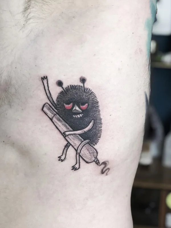 black and grey cartoon tattoo auf ribcage #43480 | Tätowierer Joanna Kru
