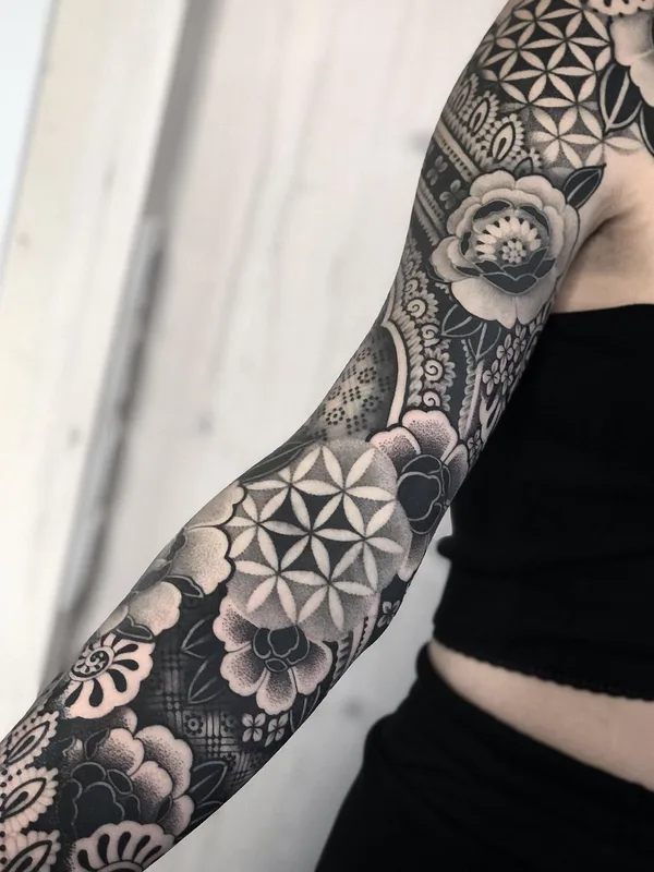 female black and grey blackwork tattoo on full sleeve #43552 | Tattoo Artist Mona Wanner