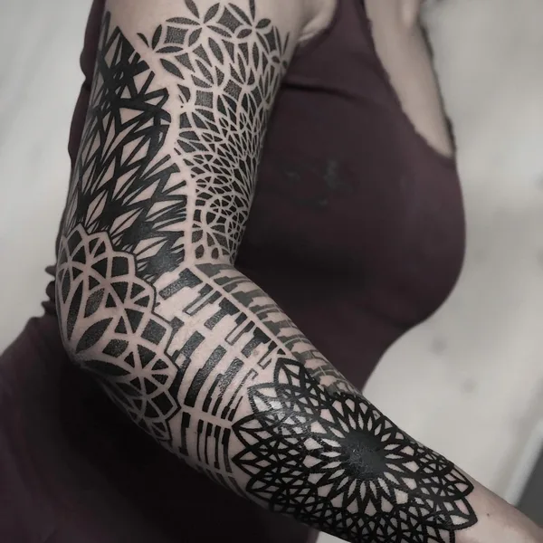 Ornamental tattoo by Mona Wanner in Innsbruck