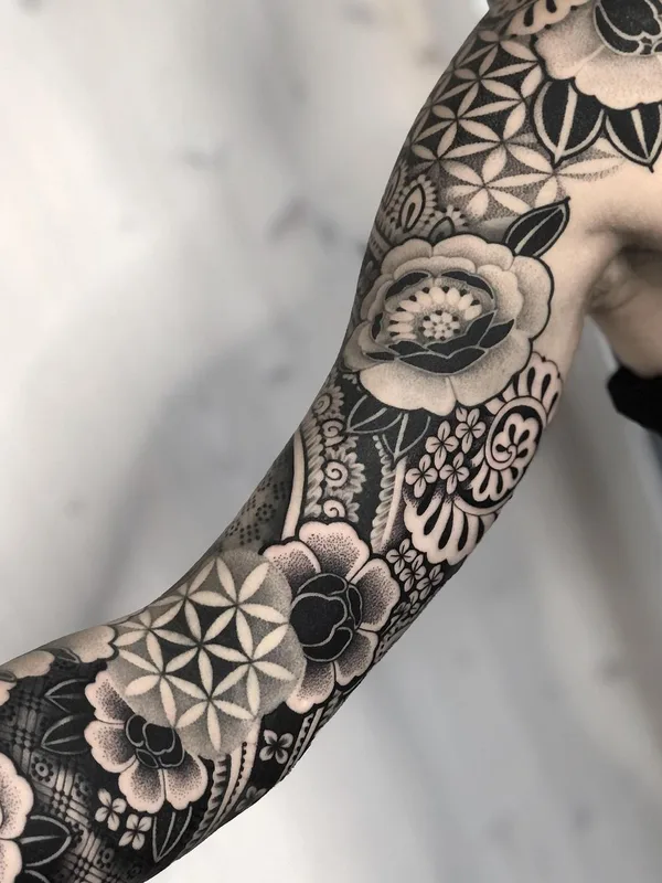 black and grey blackwork tattoo on full sleeve #43549 | Tattoo Artist Mona Wanner