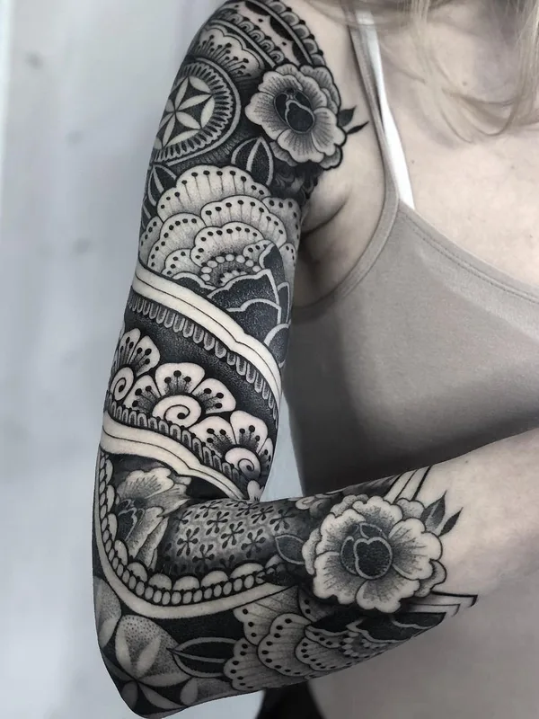 female black and grey blackwork tattoo on full sleeve #43559 | Tattoo Artist Mona Wanner