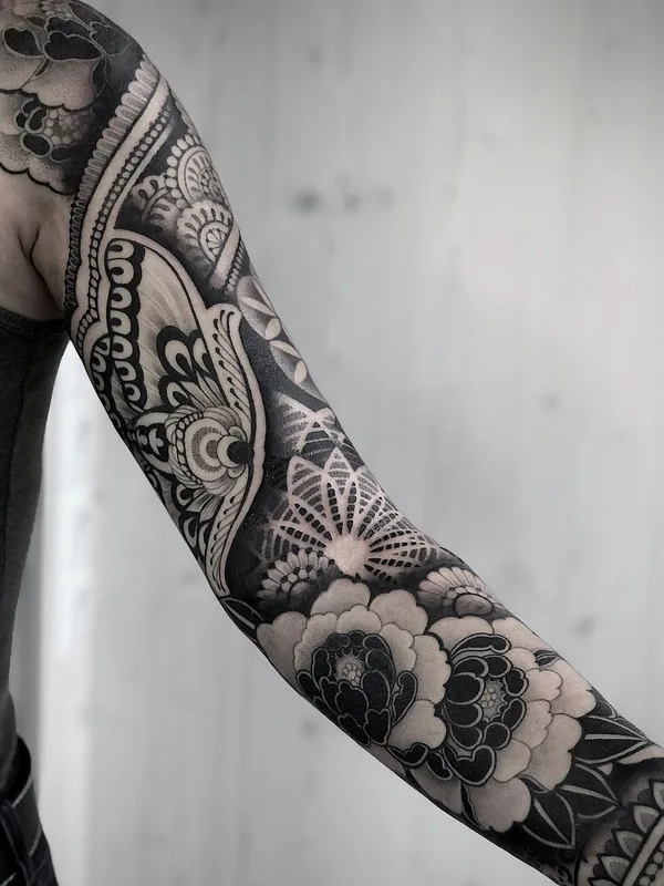 black and grey blackwork tattoo on full sleeve #43558 | Tattoo Artist Mona Wanner