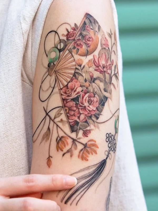 color watercolor tattoo on upper arm #46240 | Tattoo Artist Sion