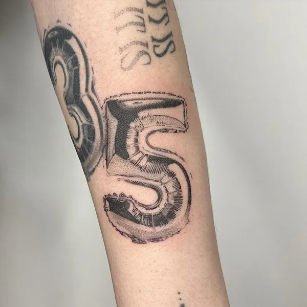 Graphic tattoo by Camille @plantsnpokes in Seattle