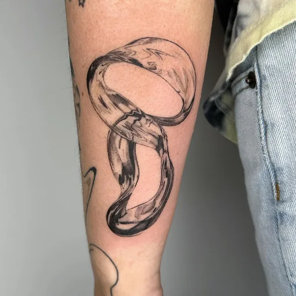 Graphic tattoo by Camille @plantsnpokes in Seattle
