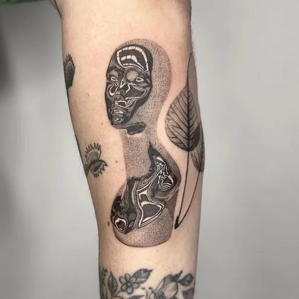 Graphic tattoo by Camille @plantsnpokes in Seattle
