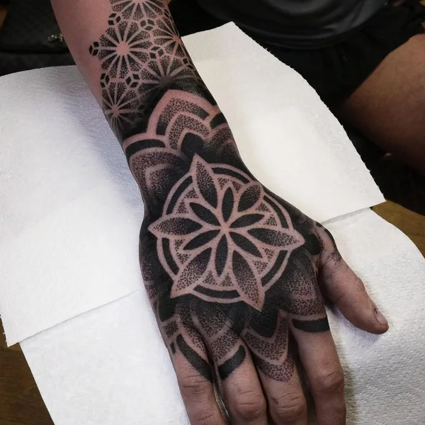 Ornamental tattoo by @tommbirchtattoo in Manchester