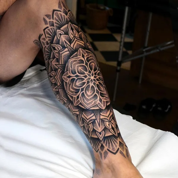 Ornamental tattoo by @tommbirchtattoo in Manchester