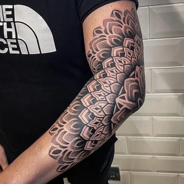 Ornamental tattoo by @tommbirchtattoo in Manchester