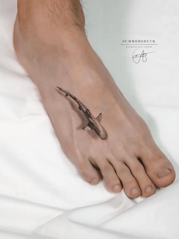 female black&gray animal, microrealism tattoo on foot #63857 | Tattoo Artist Анна Селезнева