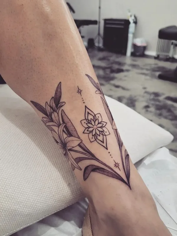 female black and grey linework tattoo on calf #67471 | Tattoo Artist moonchild_tattooing