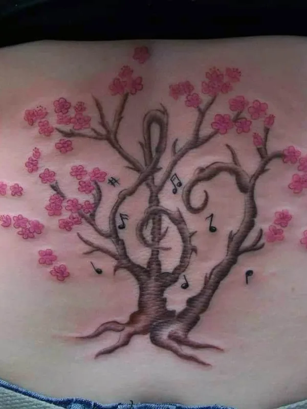 female color illustrative tattoo on lower back #69884 | Tattoo Artist John Tattooist