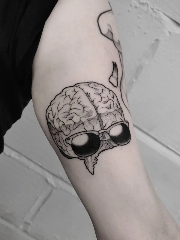 Graphic tattoo by Matt Pettis in London