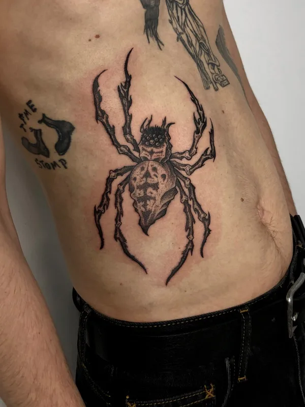 Graphic tattoo by George Pronin in Tbilisi