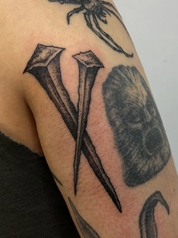 Graphic tattoo by George Pronin in Tbilisi