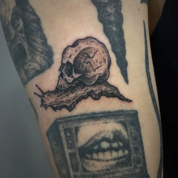 Graphic tattoo by George Pronin in Tbilisi