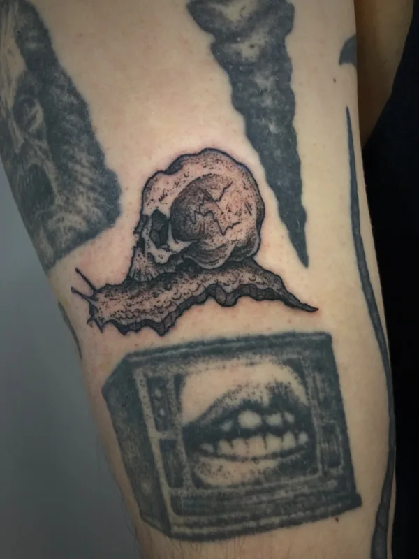 Graphic tattoo by George Pronin in Tbilisi