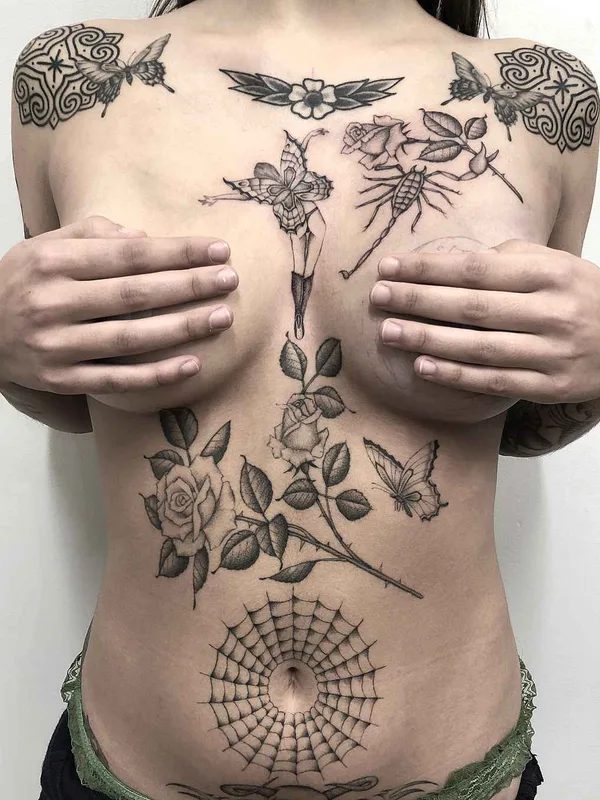 female black and grey blackwork tattoo auf chest #20090 | Tätowierer Stefan Spider Sinclair