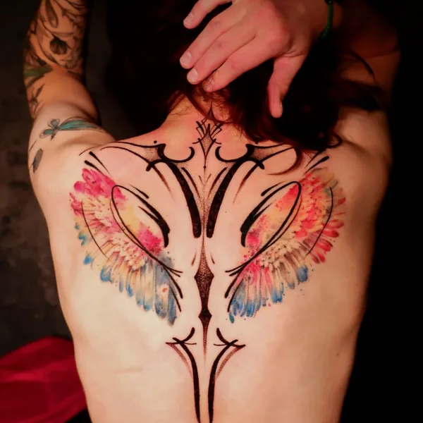 Feminine tattoo by Diana Ivashkevich in Bautzen