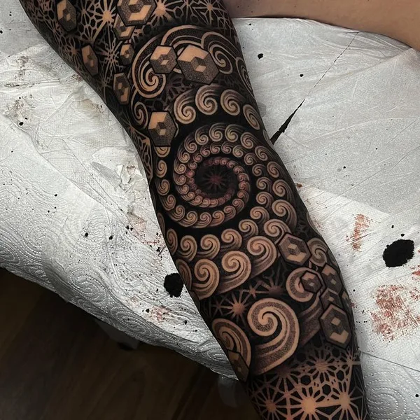 Ornamental tattoo by Eric Stricker in Barcelona