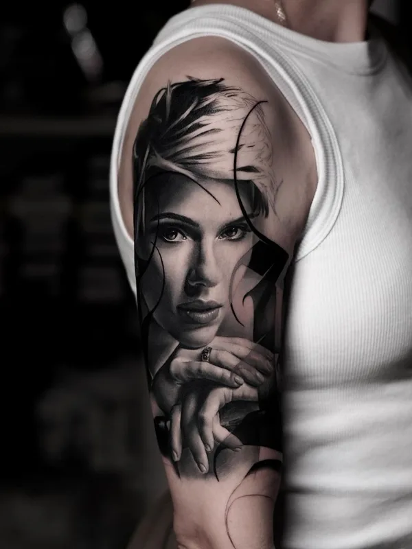 female black and grey realism tattoo on upper arm #59414 | Tattoo Artist Dan Starr