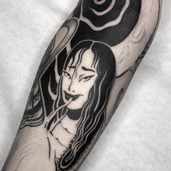 Graphic tattoo by  Lil Annie in Murcia