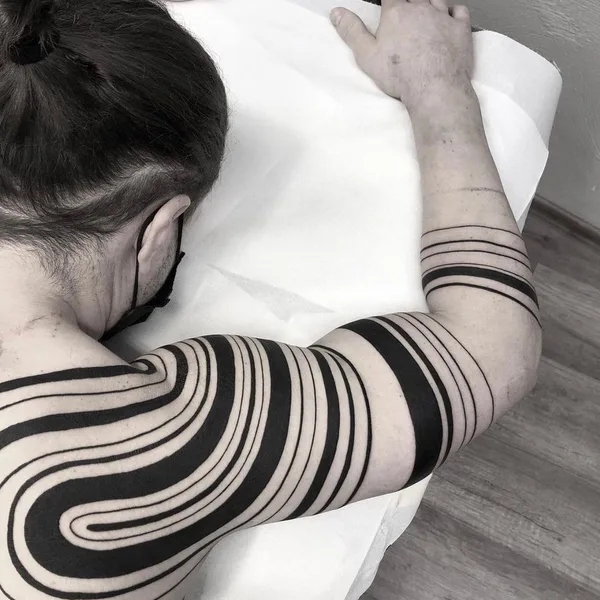 Graphic tattoo by  Lil Annie in Murcia