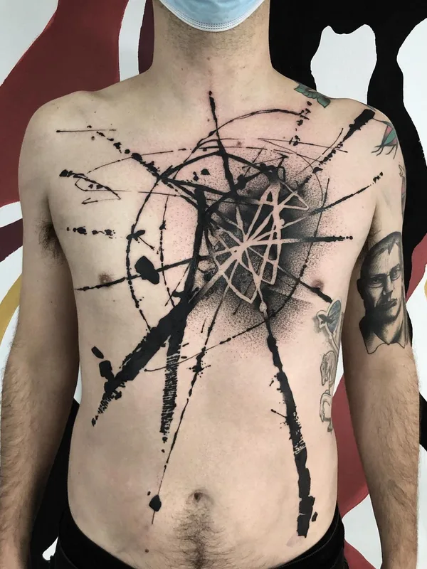 male black abstract tattoo on chest #46413 | Tattoo Artist El Cuero Miller 