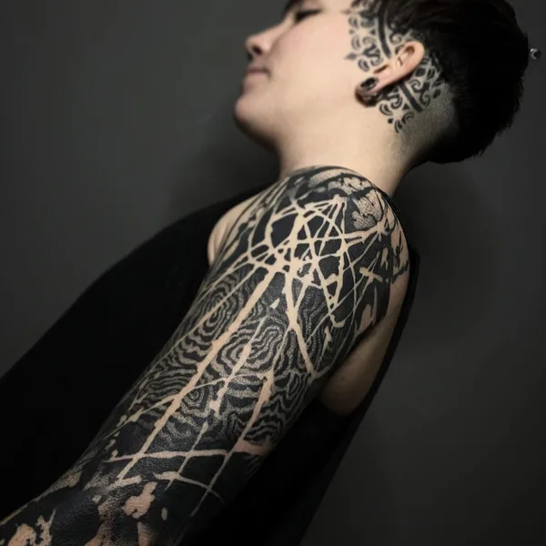 Abstract tattoo by El Cuero Miller 