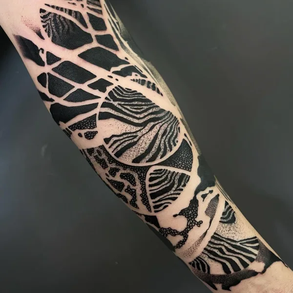 Abstract tattoo by El Cuero Miller 