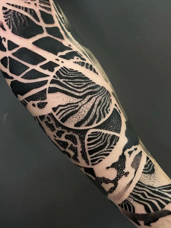 black blackwork tattoo on forearm #46421 | Tattoo Artist El Cuero Miller 