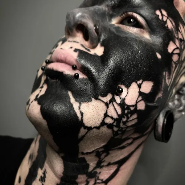 Abstract tattoo by El Cuero Miller 