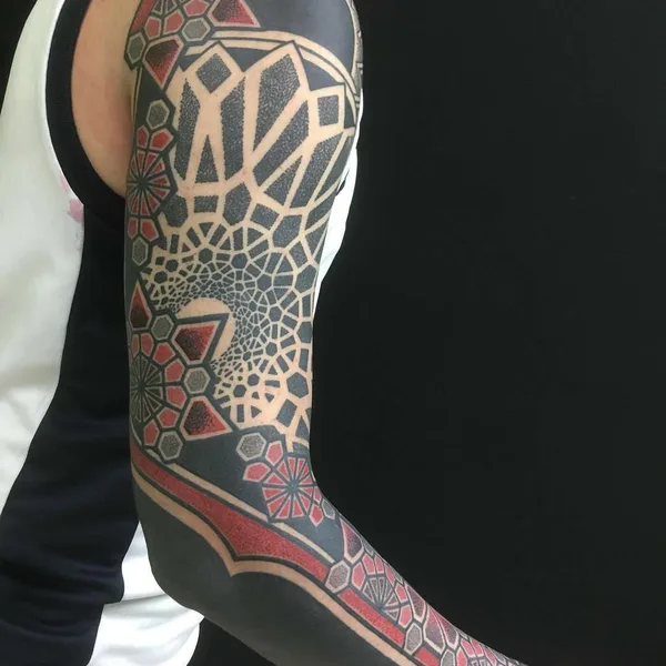 Ornamental tattoo by Pierluigi Deliperi