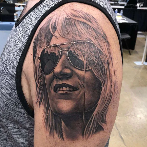 Portrait tattoo by Bob Tyrrell