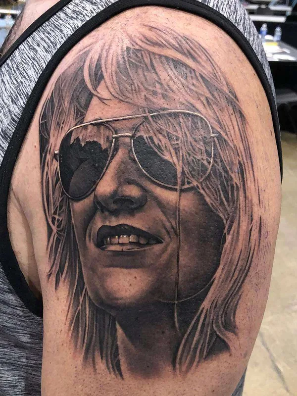 Portrait tattoo by Bob Tyrrell