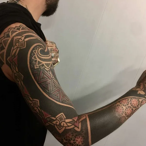Ornamental tattoo by Pierluigi Deliperi